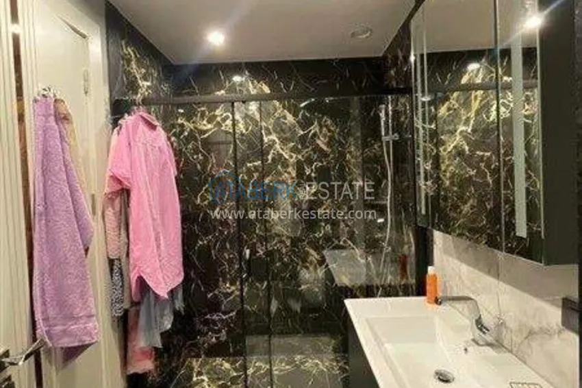 Приобрести Недвижимость в Алании - квартира 1+1 85 м2 с мебелью в премиальном resort-комплексе, район Тюрклер 6 