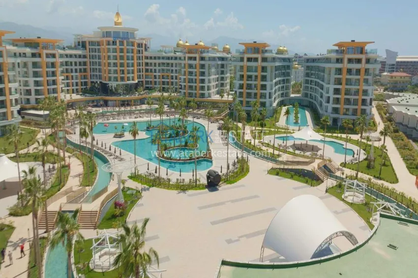 Недвижимость в Алании - квартира 1+1 85 м2 с мебелью в премиальном resort-комплексе, район Тюрклер 13 