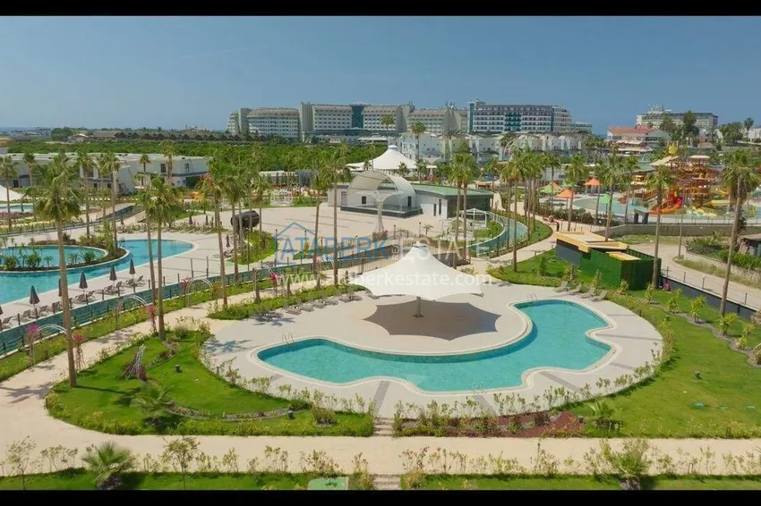 Недвижимость в Алании - квартира 1+1 85 м2 с мебелью в премиальном resort-комплексе, район Тюрклер 16 