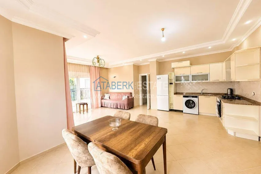 Приобрести Квартира 2+1 в Махмутларе - 130 м² с мебелью и видом на горы 1 