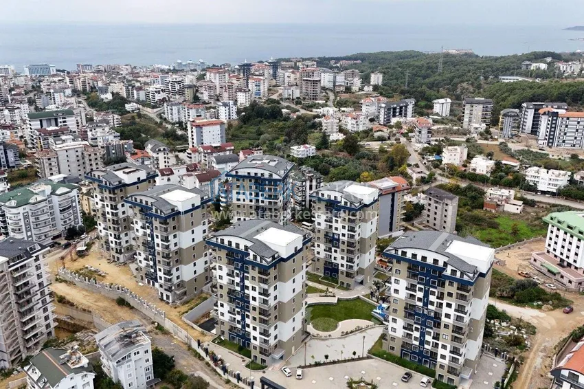 Недвижимость в Алании - квартира 1+1 в премиальном комплексе, район Авсаллар 1