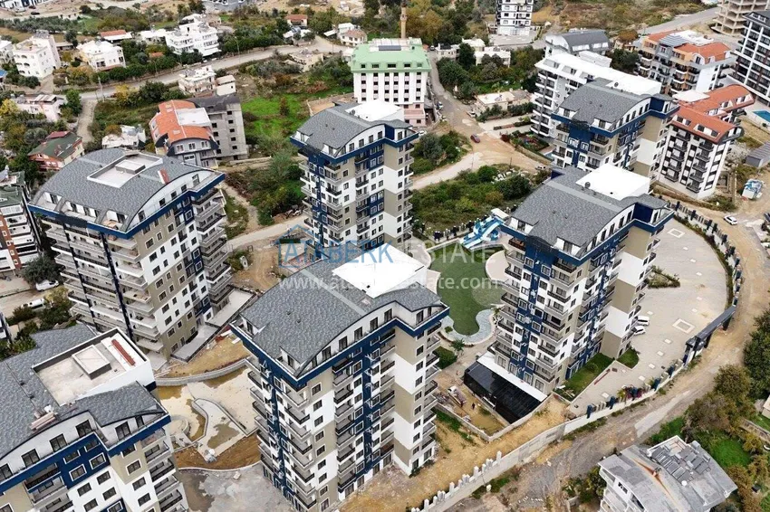 Недвижимость в Алании - квартира 1+1 в премиальном комплексе, район Авсаллар 3