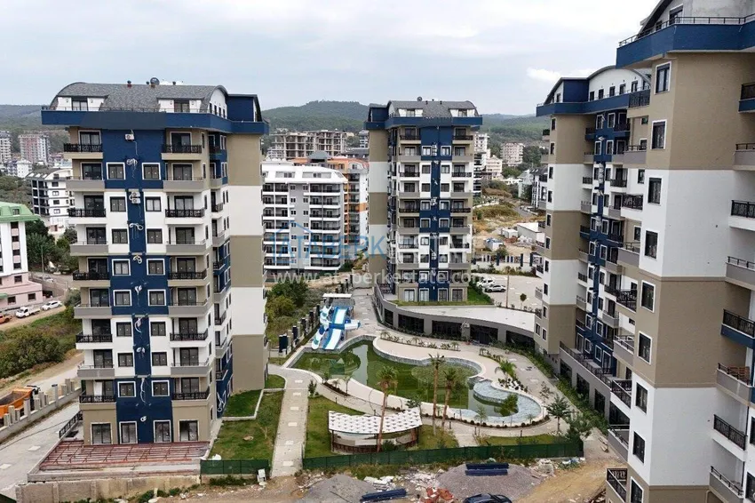 Недвижимость в Алании - квартира 1+1 в премиальном комплексе, район Авсаллар 4