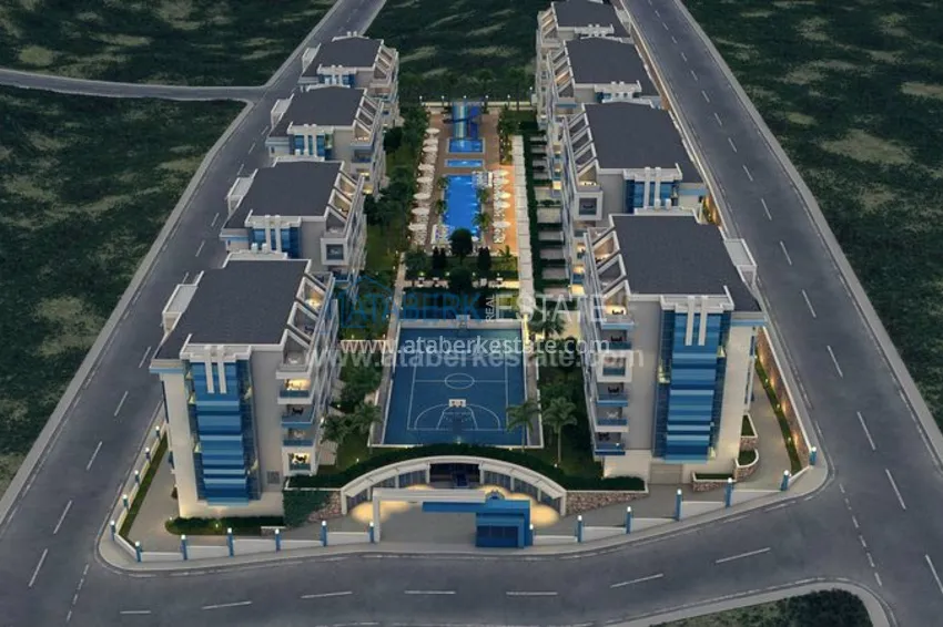 Приобрести Квартирный комплекс с инфраструктурой отеля 5 звезд недалеко от моря в Алании 1 