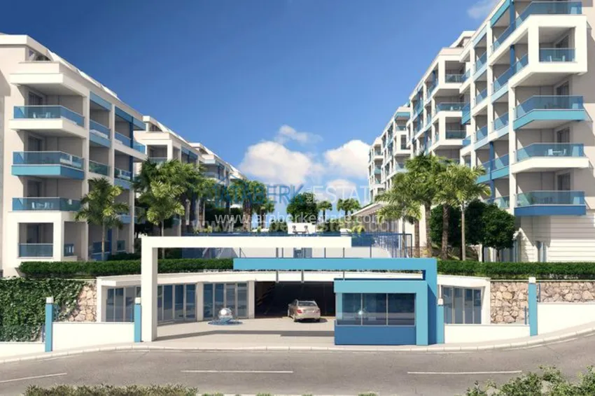 Приобрести Квартирный комплекс с инфраструктурой отеля 5 звезд недалеко от моря в Алании 3 