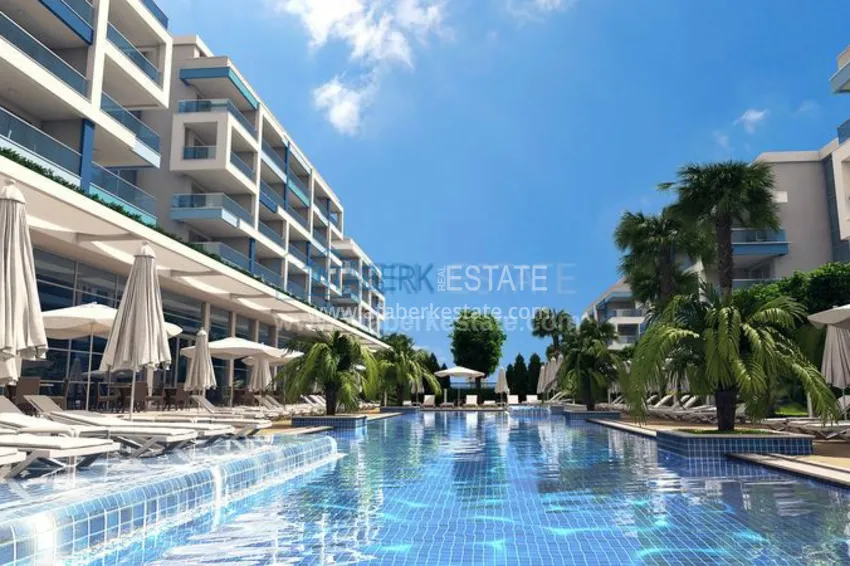 Приобрести Квартирный комплекс с инфраструктурой отеля 5 звезд недалеко от моря в Алании 7 