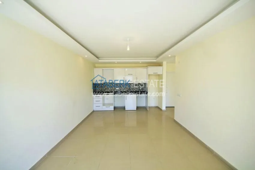 Приобрести Новая квартира 1+1 в Аланье - Махмутлар 3 