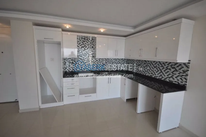 Приобрести Совершенно новые апартаменты в Аланьи район Тосмур по ценам от застройщика 3 