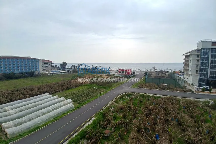 Приобрести Двухуровневая квартира с открытым видом на море в районе Кестель 4 