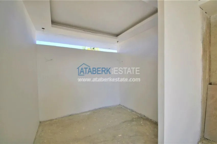 Приобрести Солнечная квартира в современном комплексе района Махмутлар 19 