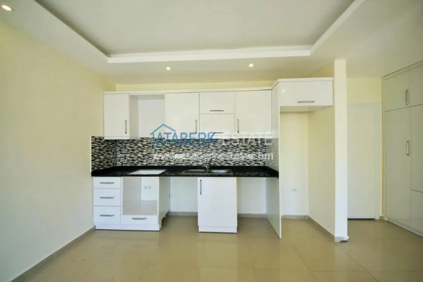 Приобрести Новая квартира 1+1 в Аланье - Махмутлар 7 