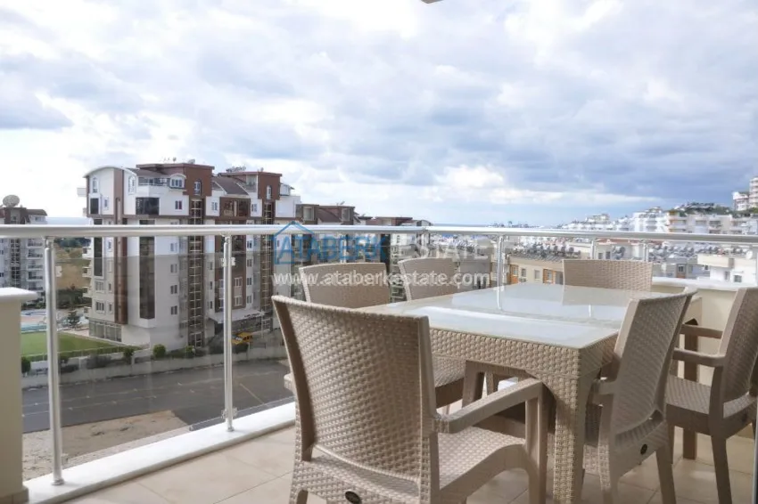 Приобрести Апартаменты 1+1 с собственным пляжем в районе Авсаллар 9 