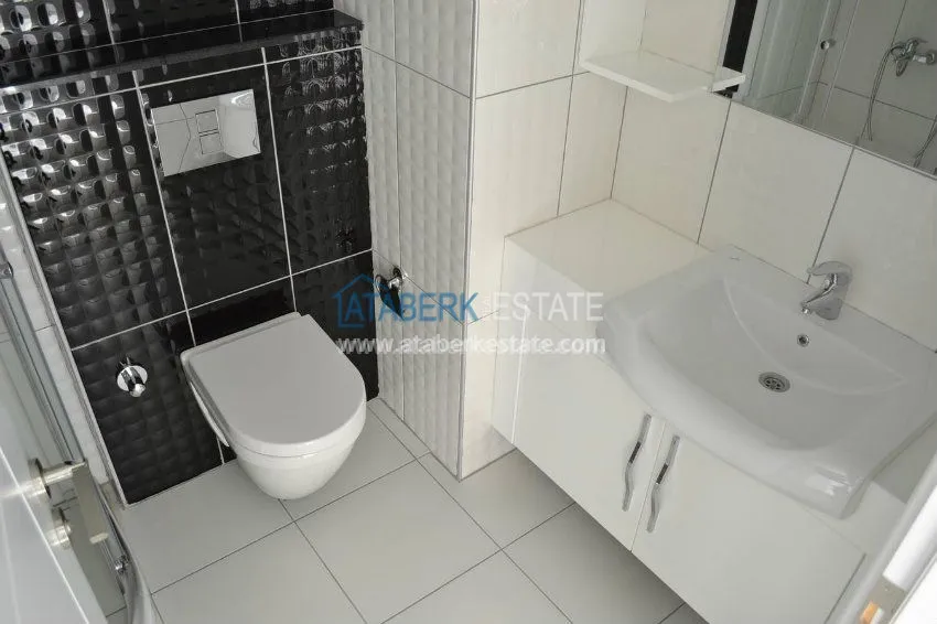 Приобрести Апартаменты 1+1  в районе Махмутлар 13 