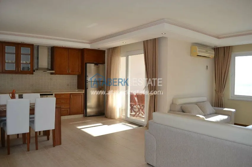 Приобрести Новые апартаменты с видом на море в центре Махмутлара 14 