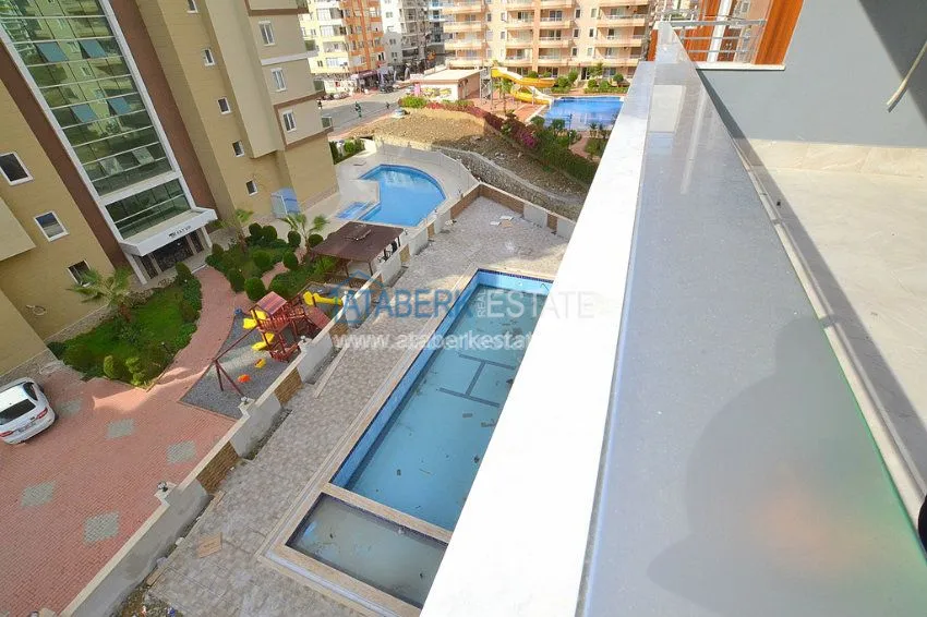 Приобрести Апартаменты 2+1 в новом комплексе района Махмутлар 4 