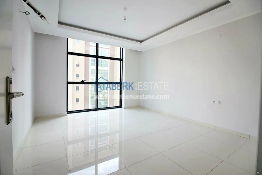 Приобрести Новая квартира 2+1 в новом доме в Махмутларе от собственника 5 