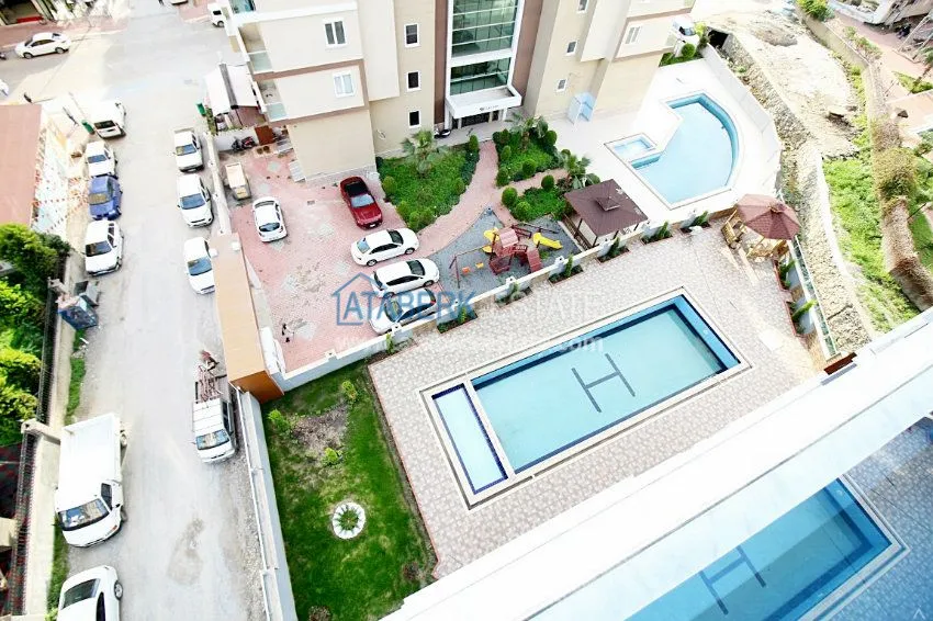 Приобрести Новая квартира 2+1 в новом доме в Махмутларе от собственника 14 