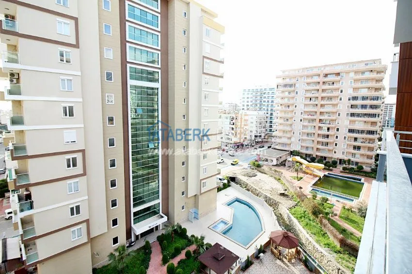 Приобрести Новая квартира 2+1 в новом доме в Махмутларе от собственника 15 