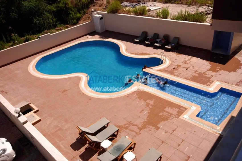 Приобрести Апартаменты 1+1 в районе Махмутлар. 11 