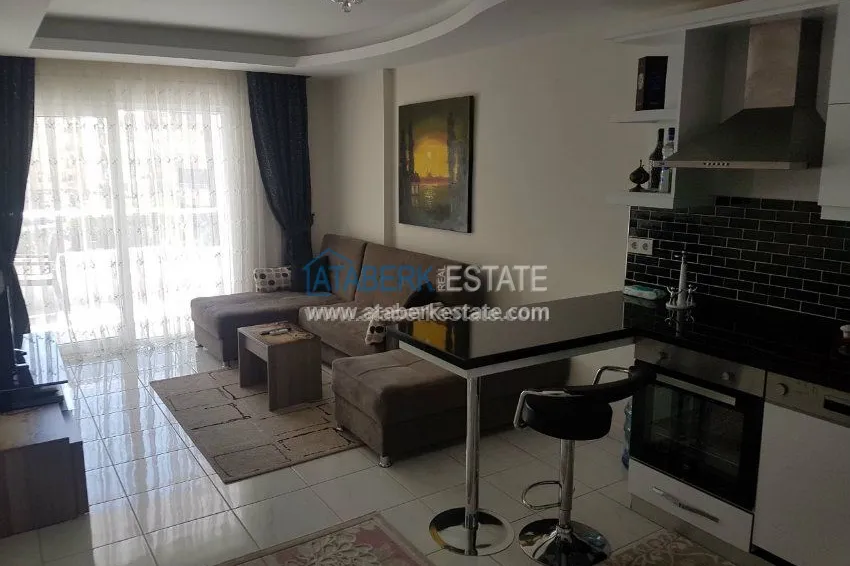 Приобрести Меблированные апартаменты 1+1 у побережья Средиземного моря. 11 