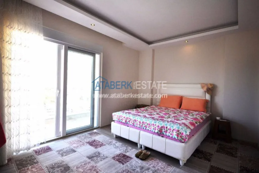 Приобрести Апартаменты 2+1 с видом на море в районе Тосмур 10 