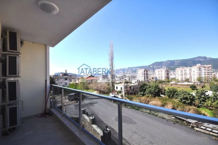 Приобрести Апартаменты 2+1 с видом на море в районе Тосмур 12 