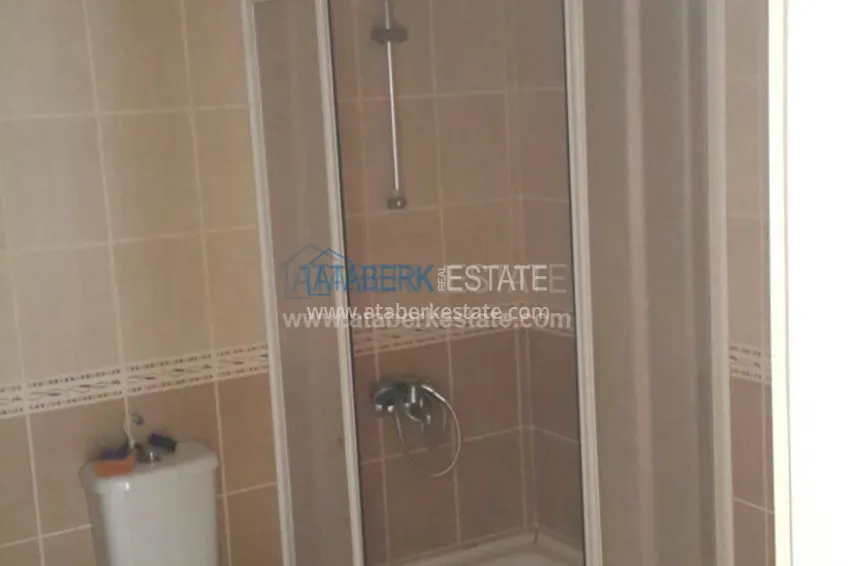 Приобрести Трехкомнатная квартира в комплексе с бассейном в центре Алании. 12 