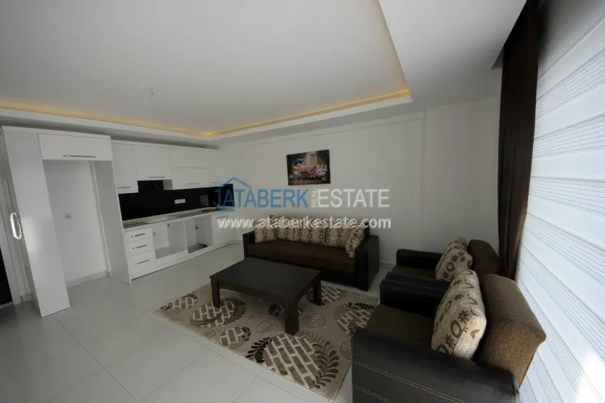 Приобрести Апартаменты 1+1 в новом комлексе популярного района Махмутлар. 12 