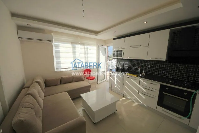 Приобрести Квартира 1+1 по доступной цене в cовременном районе Алании – Махмутлар 11 