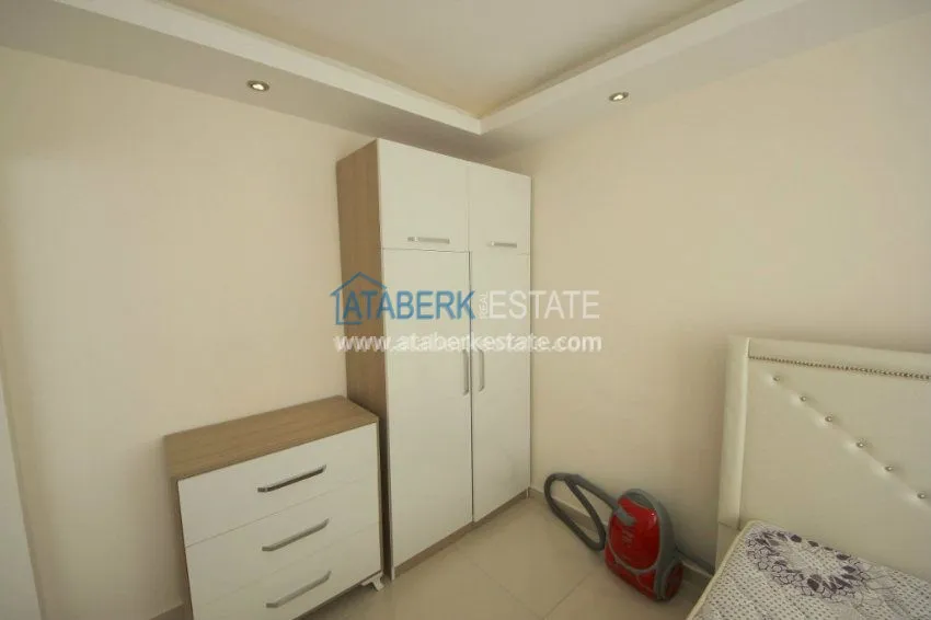 Приобрести Квартира 1+1 по доступной цене в cовременном районе Алании – Махмутлар 19 