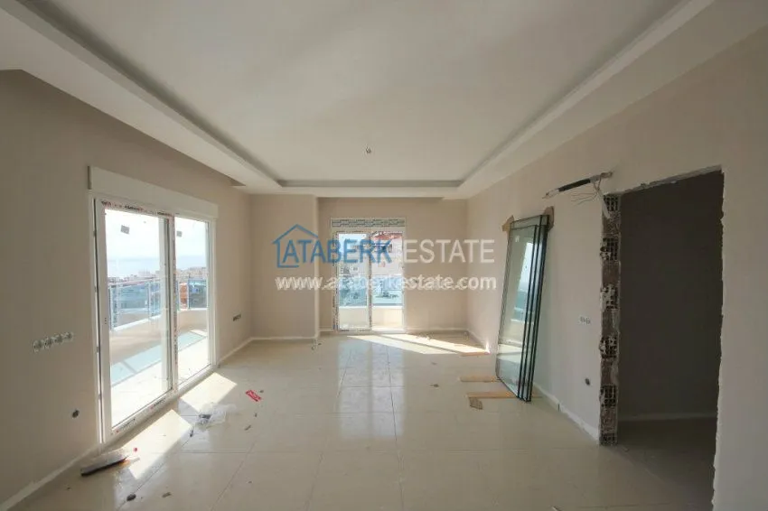 Приобрести Квартира 2+1 в новом комплексе района Махмутлар. 12 