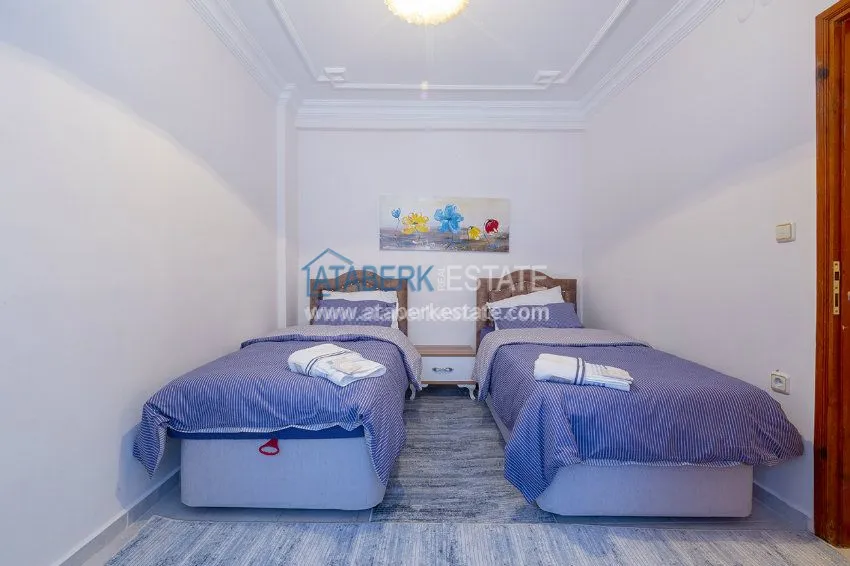 Приобрести Трехкомнатная квартира в Махмутларе 3 