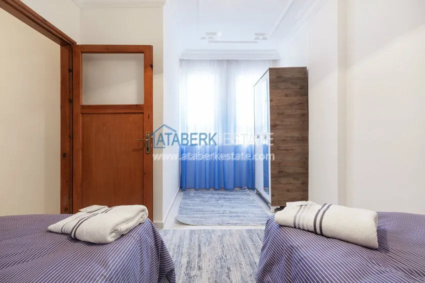 Приобрести Трехкомнатная квартира в Махмутларе 4 