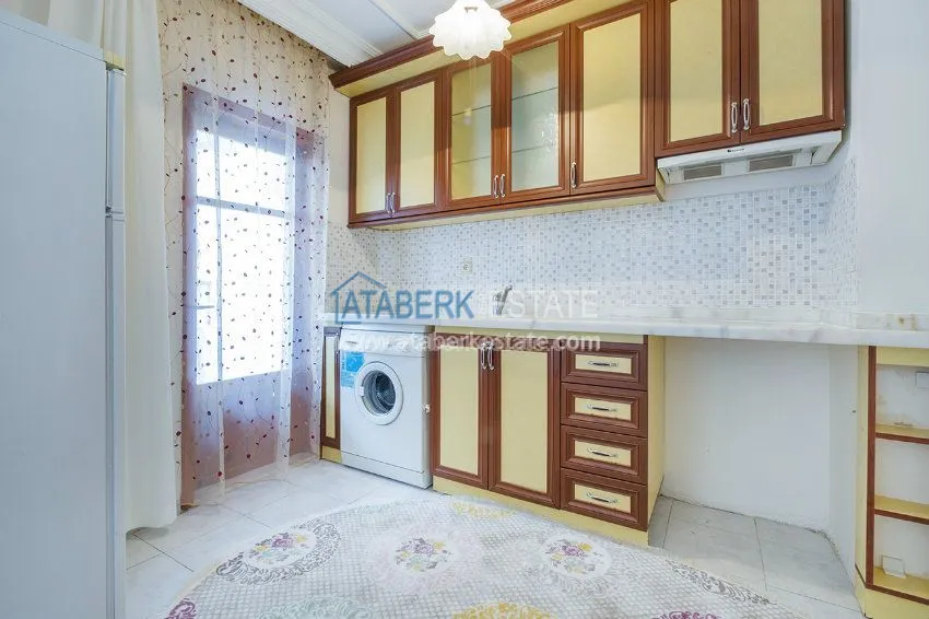 Приобрести Трехкомнатная квартира в Махмутларе 9 