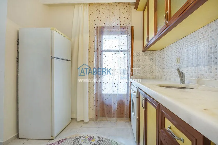 Приобрести Трехкомнатная квартира в Махмутларе 10 