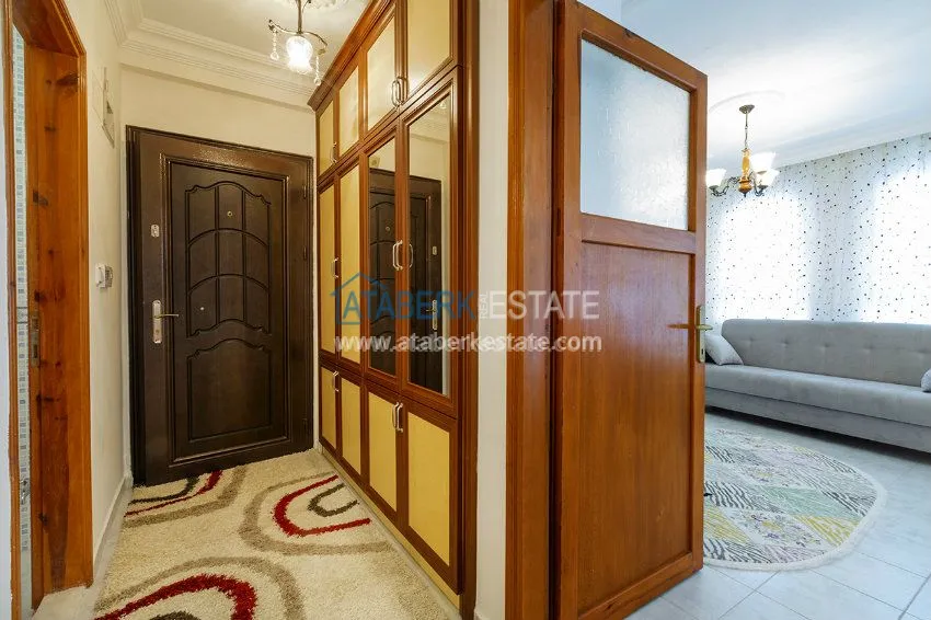 Приобрести Трехкомнатная квартира в Махмутларе 17 