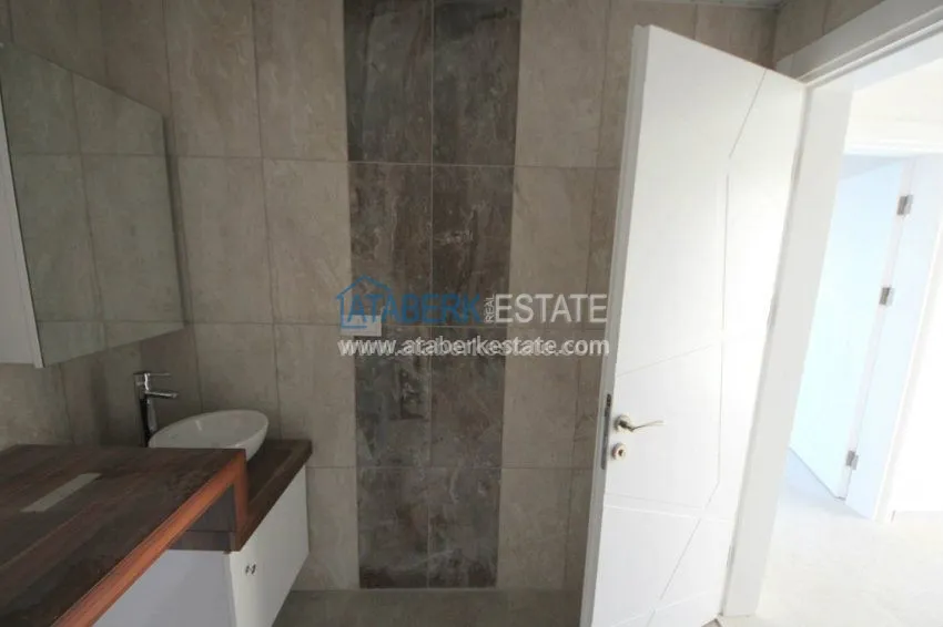 Приобрести Апартаменты 1+1 в  современном комплексе от надежного застройщика в районе Махмутлар 9 