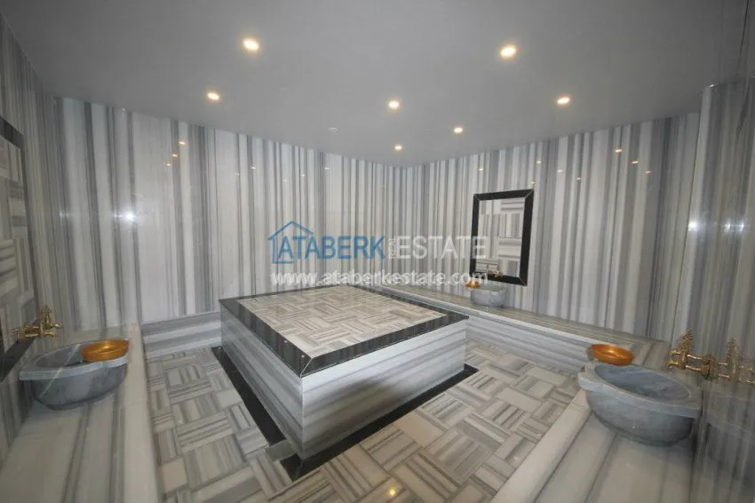 Приобрести Апартаменты 1+1 в  современном комплексе от надежного застройщика в районе Махмутлар 19 