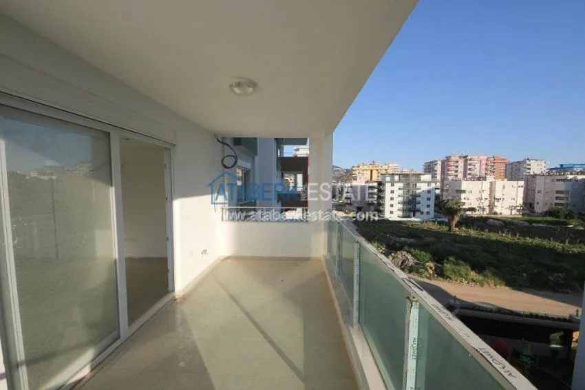 Приобрести Апартаменты 1+1 в  современном комплексе от надежного застройщика в районе Махмутлар 30 