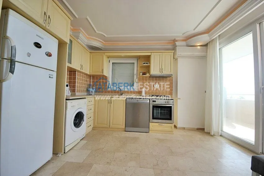 Приобрести Меблированная квартира 2+1 в Махмутларе с прямым видом на море, 50 метров от пляжа 3 