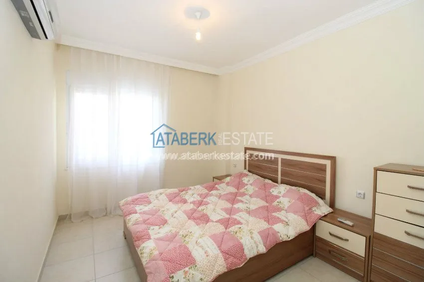 Приобрести Меблированные апартаменты 1+1 в 200 метрах от пляжей. 9 