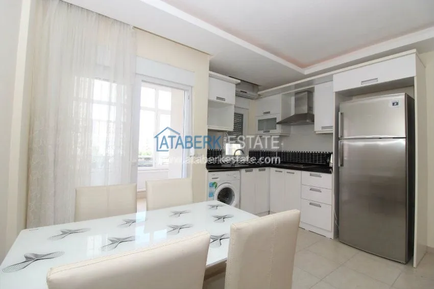 Приобрести Меблированные апартаменты 1+1 в 200 метрах от пляжей. 11 