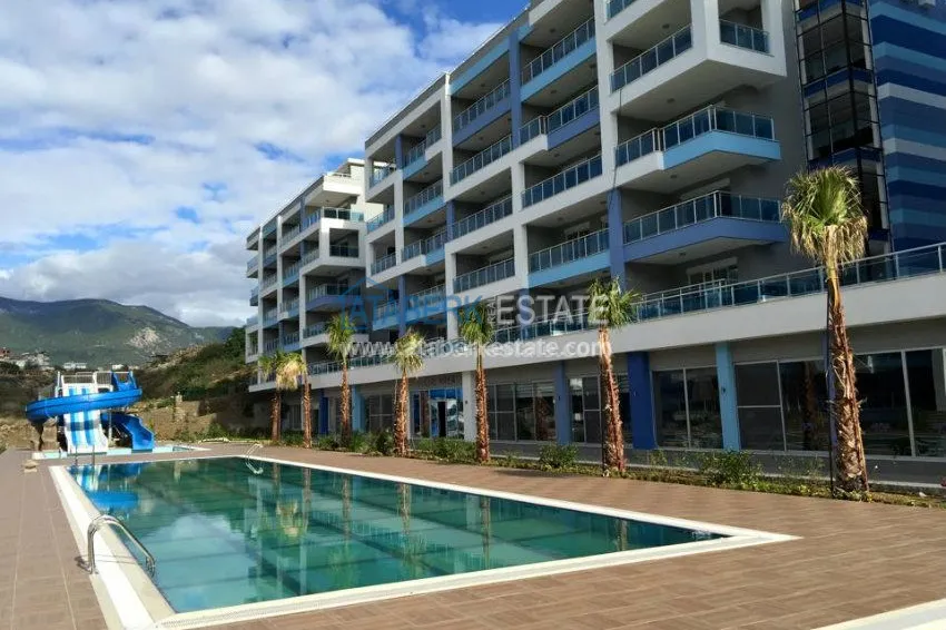 Квартирный комплекс с инфраструктурой отеля 5 звезд недалеко от моря в Алании 3 