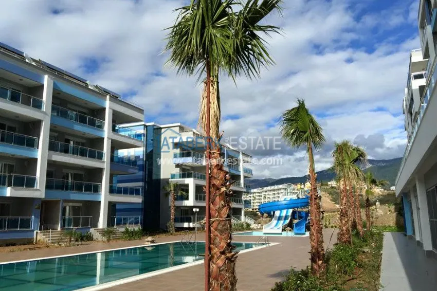 Квартирный комплекс с инфраструктурой отеля 5 звезд недалеко от моря в Алании 4 