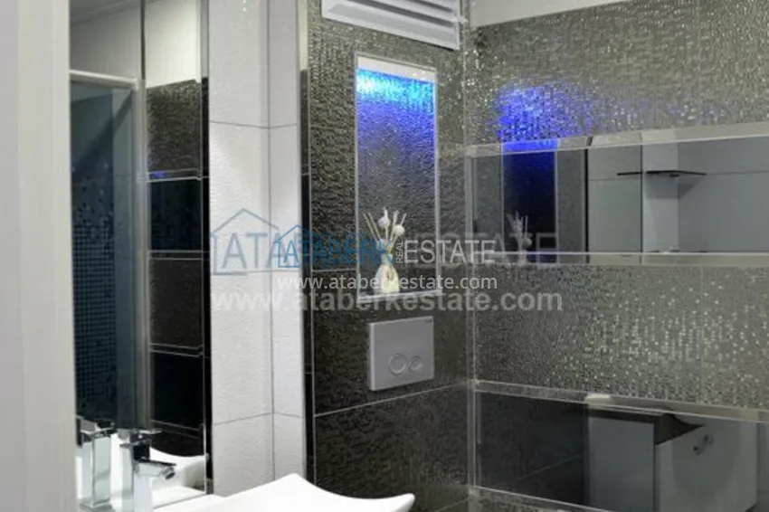 Квартира с дизайнерским ремонтом в Алании 16