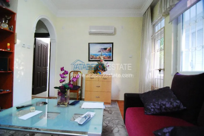 Двухкомнатная квартира с выходом в сад в центре города Алания. 5 