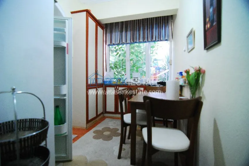 Двухкомнатная квартира с выходом в сад в центре города Алания. 11 