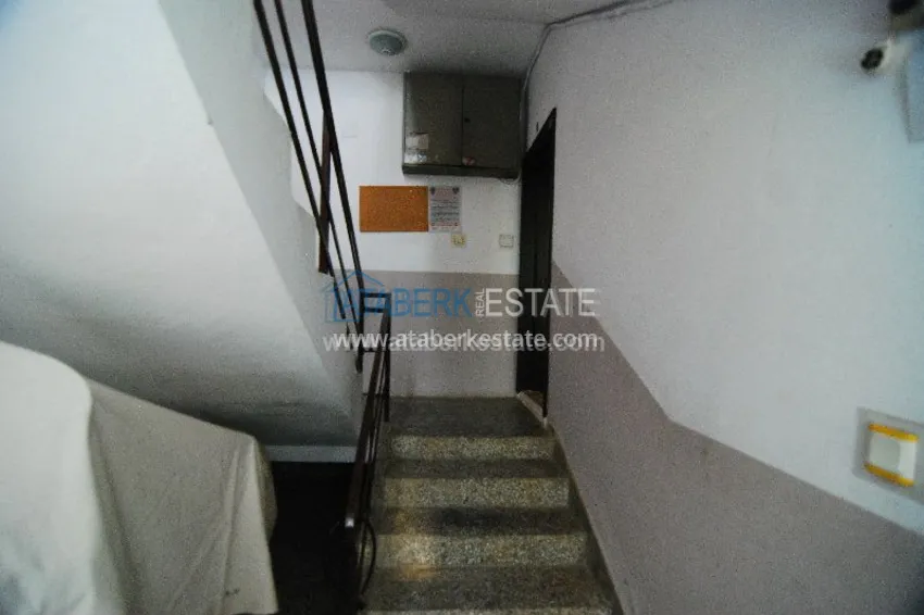 Двухкомнатная квартира с выходом в сад в центре города Алания. 13 