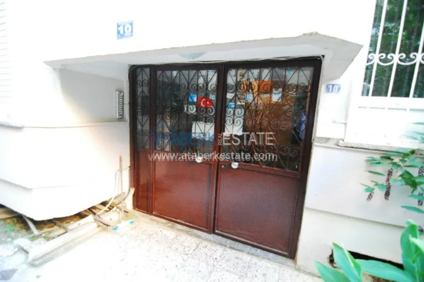 Двухкомнатная квартира с выходом в сад в центре города Алания. 17 