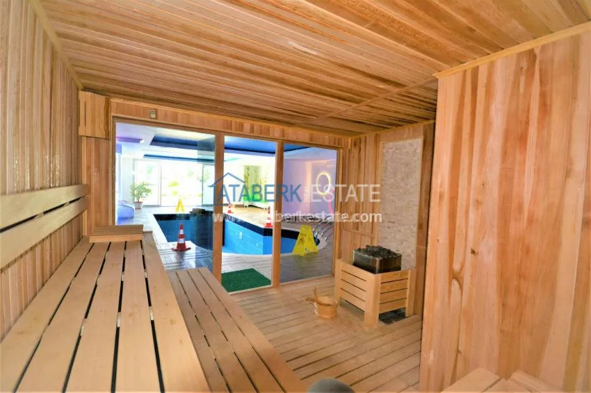 Трехкомнатная квартира в современном комплексе Махмутлара 10 